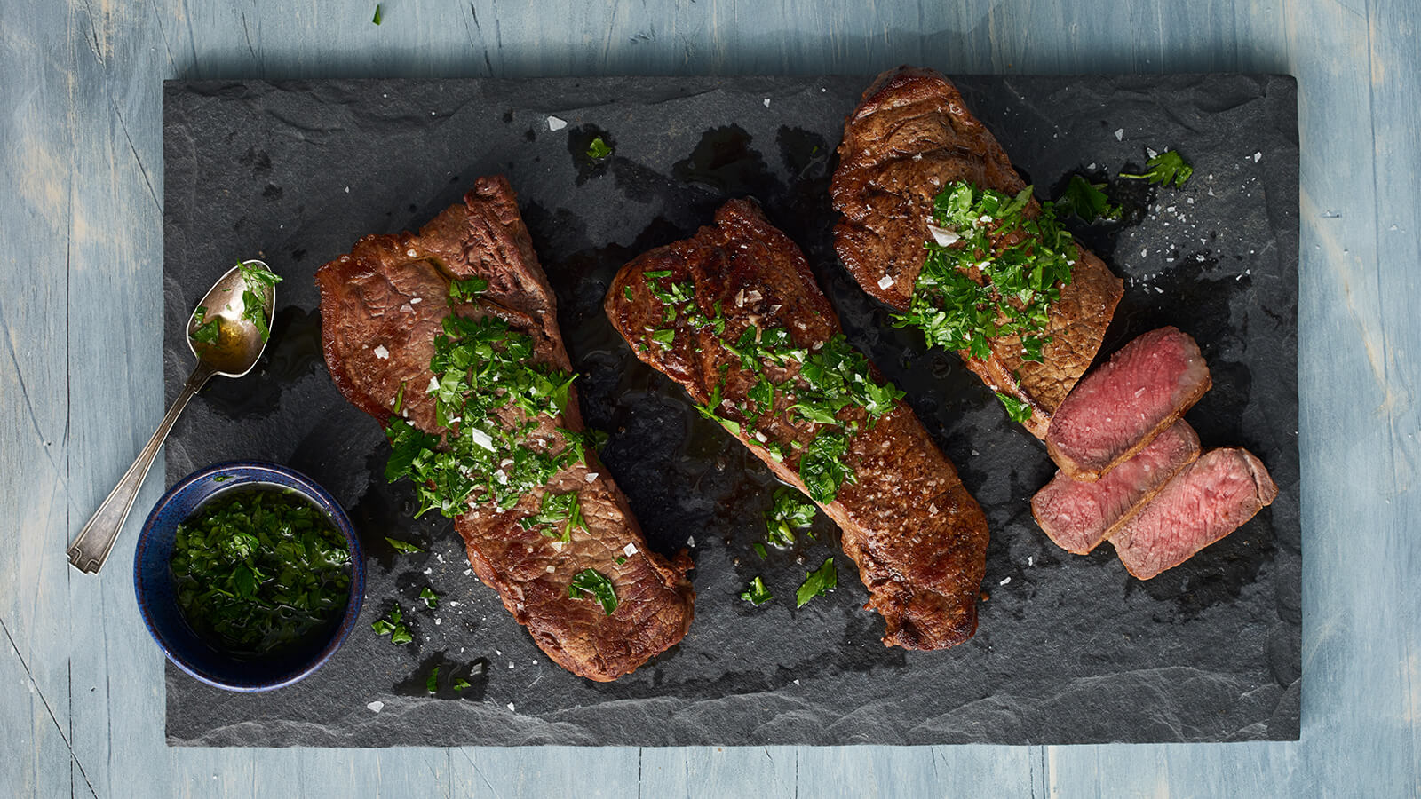 Grilled New York Strip with Garlic Herb Oil